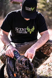 a hunter pulling Scent Assassin field wipes from his hunting bag
